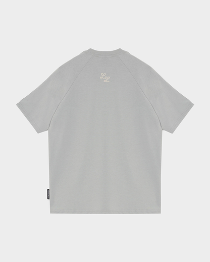 CAMISETA LL SESGOS GRIS CREMA